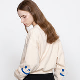 エルボードローイングスマイルクロップドスウェットシャツ / ELBOW Drawing Smile Cropped Sweatshirt