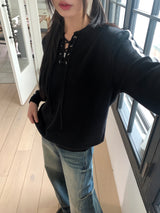 Gender eyelet strap long sleeve knit