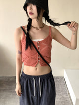 サリーボタンパンチングレイヤードニットノースリーブ / Sally button punching layered knit sleeveless