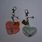 Fluffy tied bear keychain