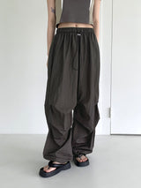 メトムレッグシャーリングバスロックナイロンツーウェイジョガーパンツ/ Methom Leg Shirring Baslock Nylon Two Way Jogger Pants
