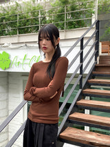 Tatin back buckle strap slit long sleeve t-shirt