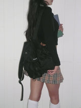 Black round pocket backpack