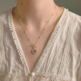 Stamp necklace