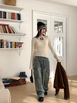 Kinu star point boat neck long sleeve knit