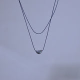 layered string necklace