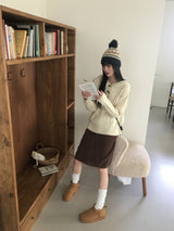 トゥゴーツイストハーフトッポッキボタンフードニット