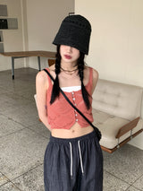 サリーボタンパンチングレイヤードニットノースリーブ / Sally button punching layered knit sleeveless
