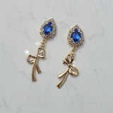 ロイヤルブルークリスタルアンドゴールドリボンピアス / Royal Blue Crystal and Gold Ribbon Piercing