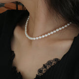 14K GOLD-FILLED RICE PEARL NECKLACE (6680547983478)