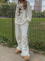 (UNISEX) ベルベットサイドラインスナップトレーニングパンツ