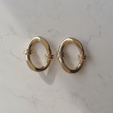 ノッティドオーバルリングピアス