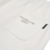 ESSENTIAL LOGO SEASON2 TRAINING PANTS IVORY