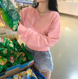 パステルVネッククロップドスウェットシャツ