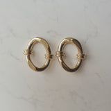 ノッティドオーバルリングピアス
