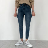 Whiskered Two-Button High Waist Skinny Jeans