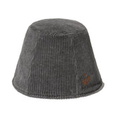CHERRY REVERSIBLE FUR BUCKET HAT [BLACK]