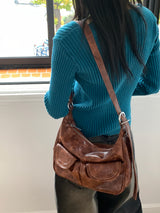Unbarred two-pocket vintage washed leather shoulder bag