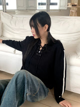 Gender eyelet strap long sleeve knit