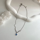 bi サージカルスチールブルーキャットアイコインハートキッチュネックレス / bi Surgical Steel Blue Cats Eye Coin Heart Kitch Necklace