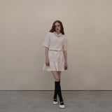 Cream Cancan Mini Skirts