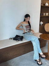 Belted light blue bootcut denim pants