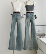 Belted light blue bootcut denim pants