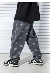 スマイルパターンデニムパンツ/SMILE PATTERN DENIM PANTS (BLACK)