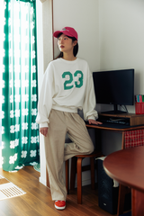 23プリントスウェットシャツ