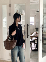 Gender eyelet strap long sleeve knit