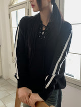 Gender eyelet strap long sleeve knit