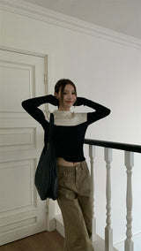 Black and white cut knit top