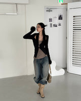 a sleeved bolero layered cardigan