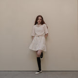 Cream Cancan Mini Skirts