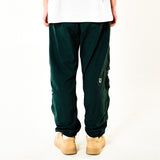 スクルーアップジッパージョガーパンツ / SCREW UP ZIPPER JOGGER PANTS (GREEN)