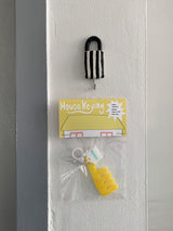 ヘアブラシキーリング / Yellow hairbrush keyring
