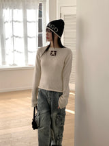 Kinu star point boat neck long sleeve knit
