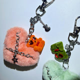 Fluffy tied bear keychain