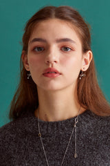 Knot ribbon drop surgical earring