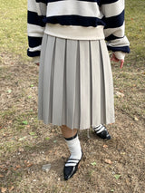 フリンジカットアウトミディプリーツスカート