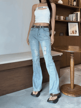 Belted light blue bootcut denim pants