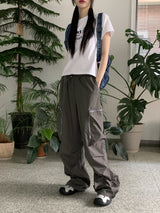 アコンジッパーポケットナイロンワイドツーウェイジョガーパンツ/ Acorn Zip Pocket Nylon Wide Two Way Joggers