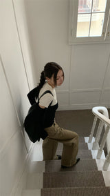 Black and white cut knit top