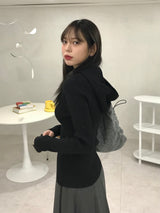 Behind hood T 