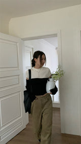 Black and white cut knit top