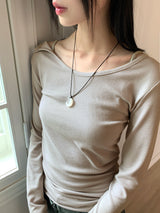 Heat unbuttoned off-shoulder snap totto button long-sleeved t-shirt