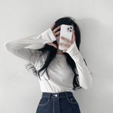 エクステンデッドスリーブラウンドネックTシャツ