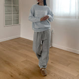Butteroll angora lettering overfit crop long sleeve knit