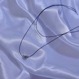 layered string necklace