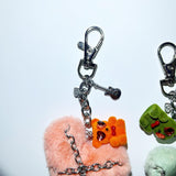Fluffy tied bear keychain